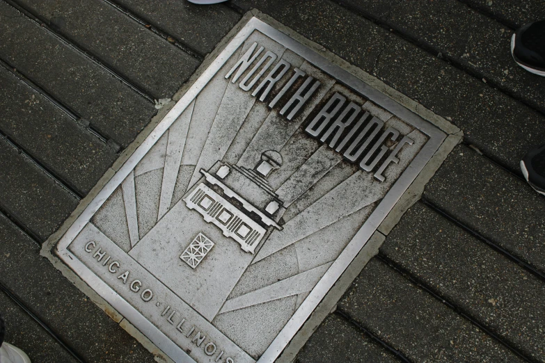 this is a very cool street sign on the ground