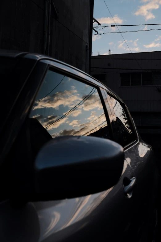 the rear window of a car in a city