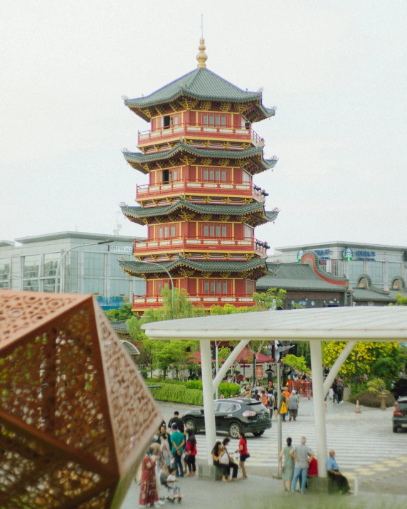 an old po of a pagoda on a rainy day