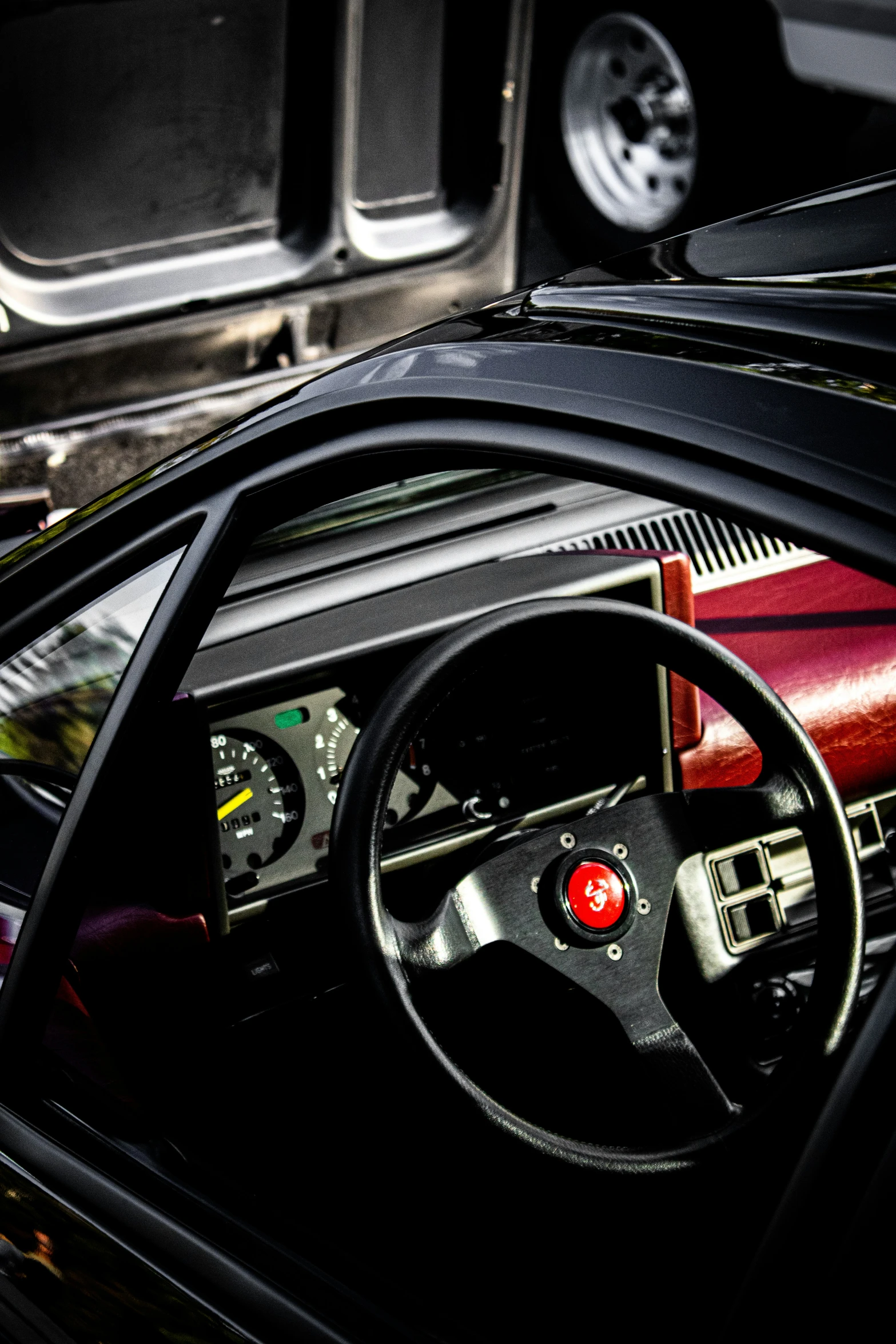 the interior of a car with its steering wheel up