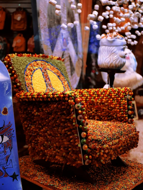 a chair that is covered in ons and beads