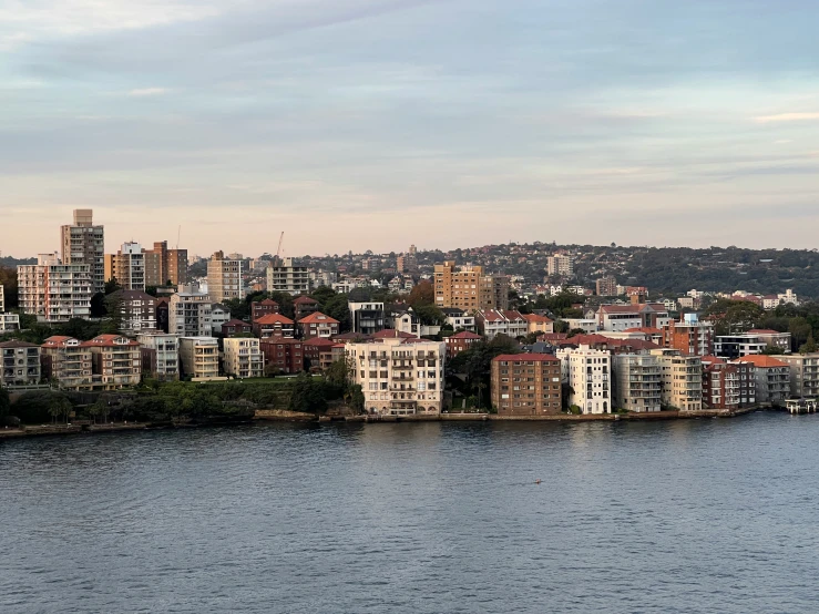 some buildings that are near the water