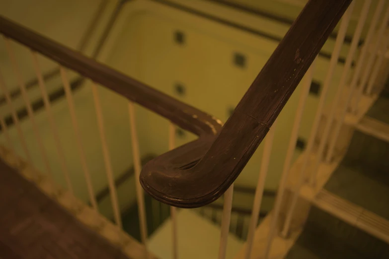 a wooden stair case in a home with no railing