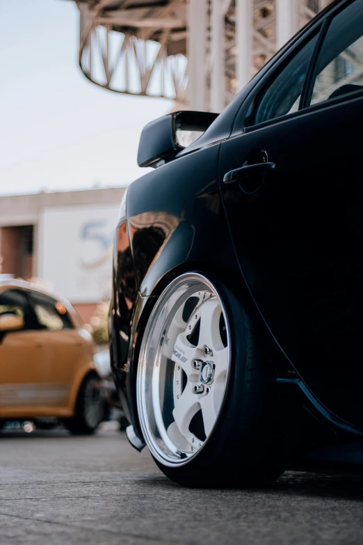 the wheel and tire rims on a car