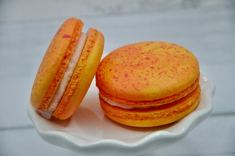 an image of two pastries with yellow icing