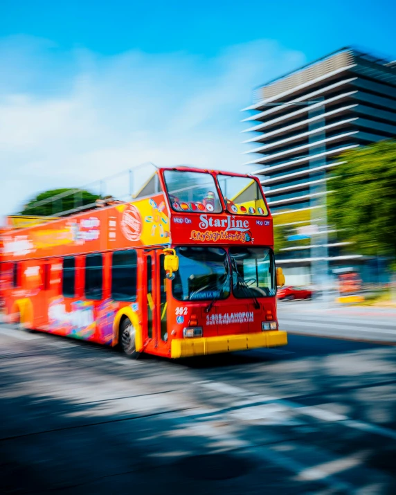 a double decker bus traveling down a city street