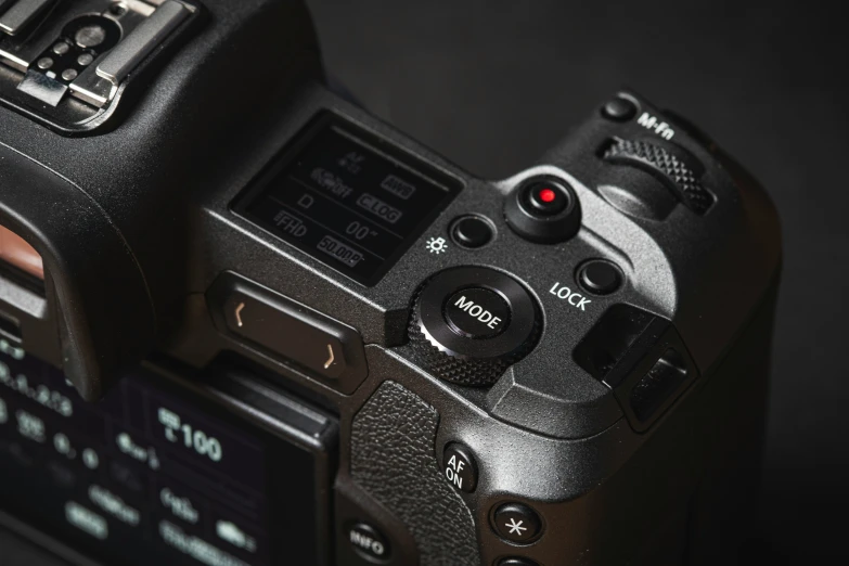 a black camera with different settings and ons