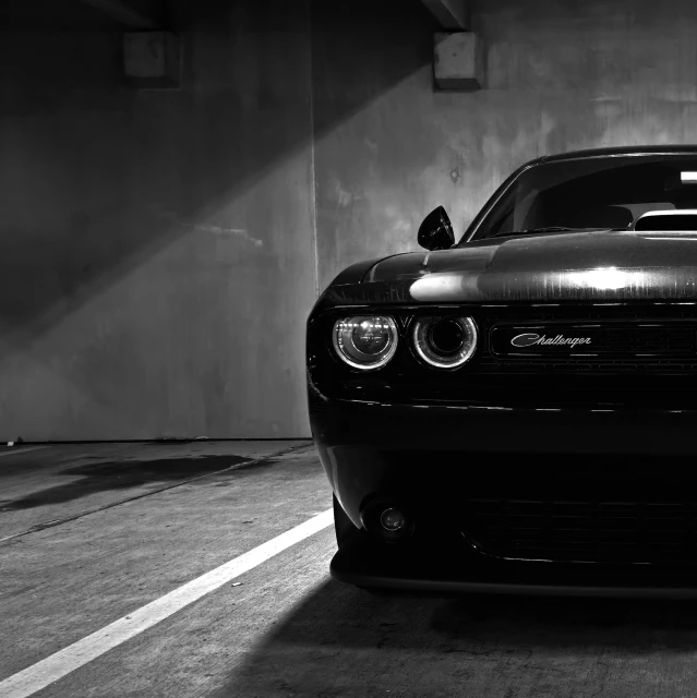 a black and white po of a black sports car