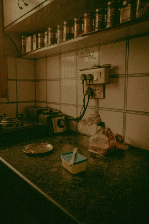 a kitchen counter that has various items on it