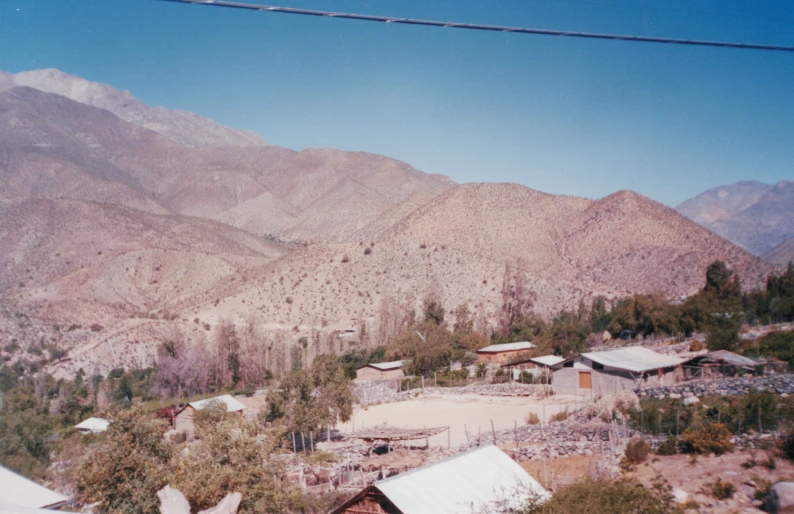 a village in the mountains near a forest