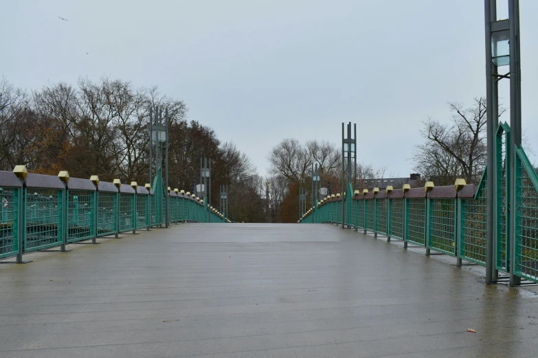 a bridge with benches on each side during the day