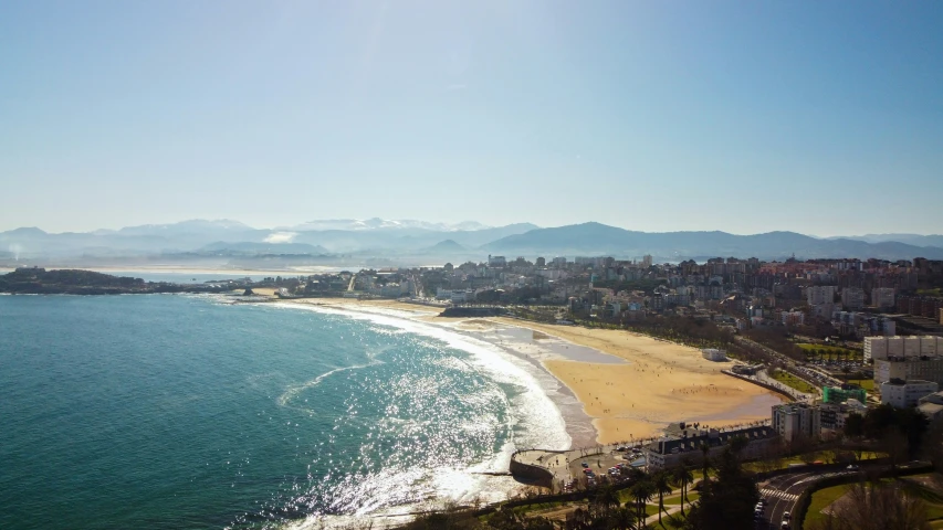 the city sits beside the water and its beach