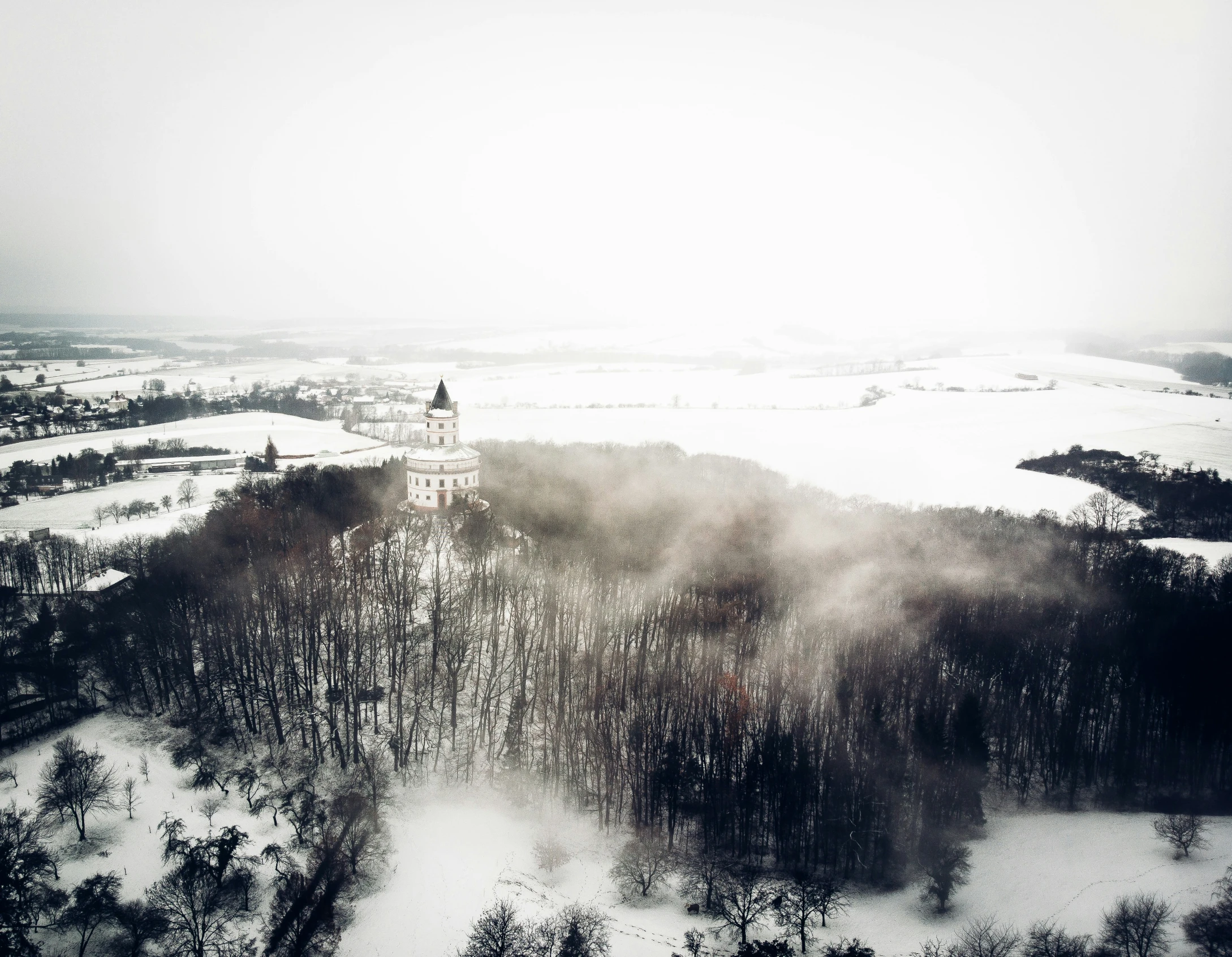 a very snowy landscape with snow on the ground