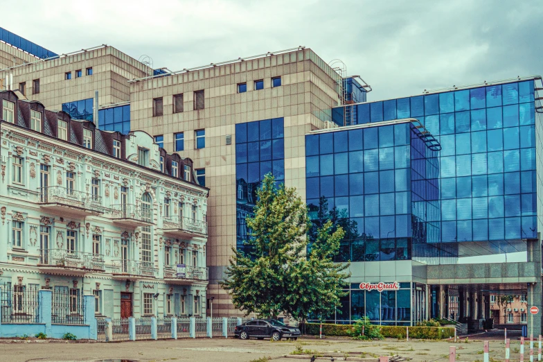 a city with many older buildings and one tree