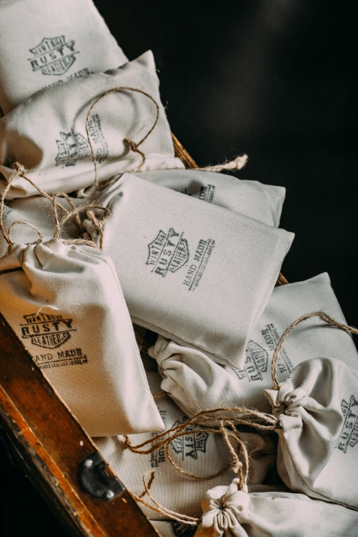 many bags with writing on them tied together