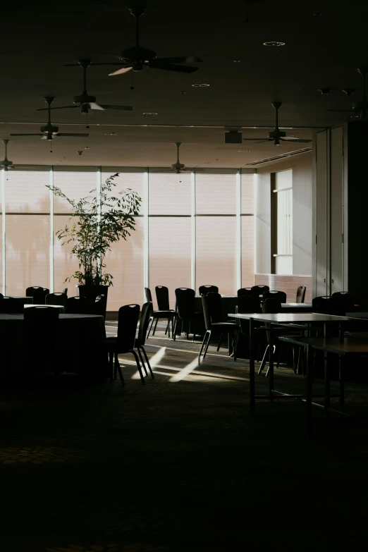 a very long table in a nice and empty room