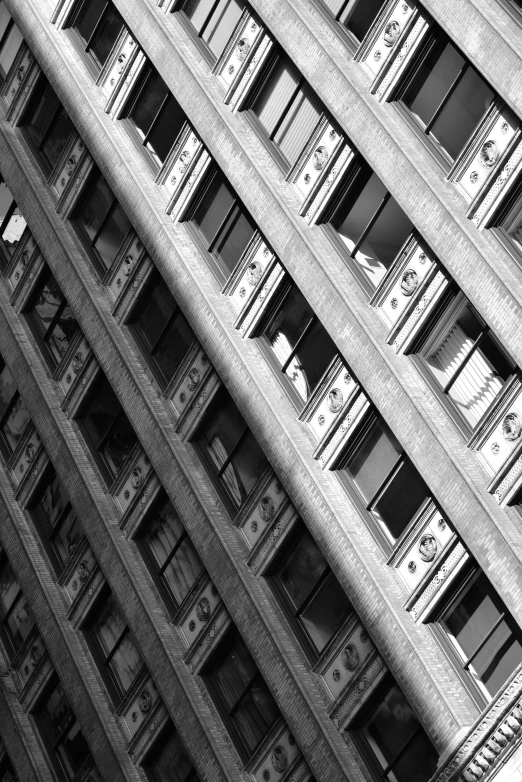 windows of buildings reflecting off of one another