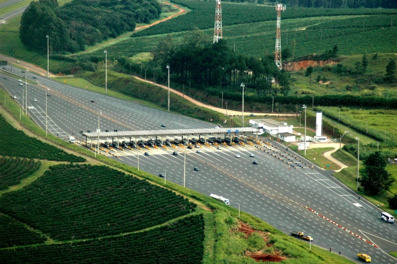 a traffic jam on a highway with several vehicles at the side