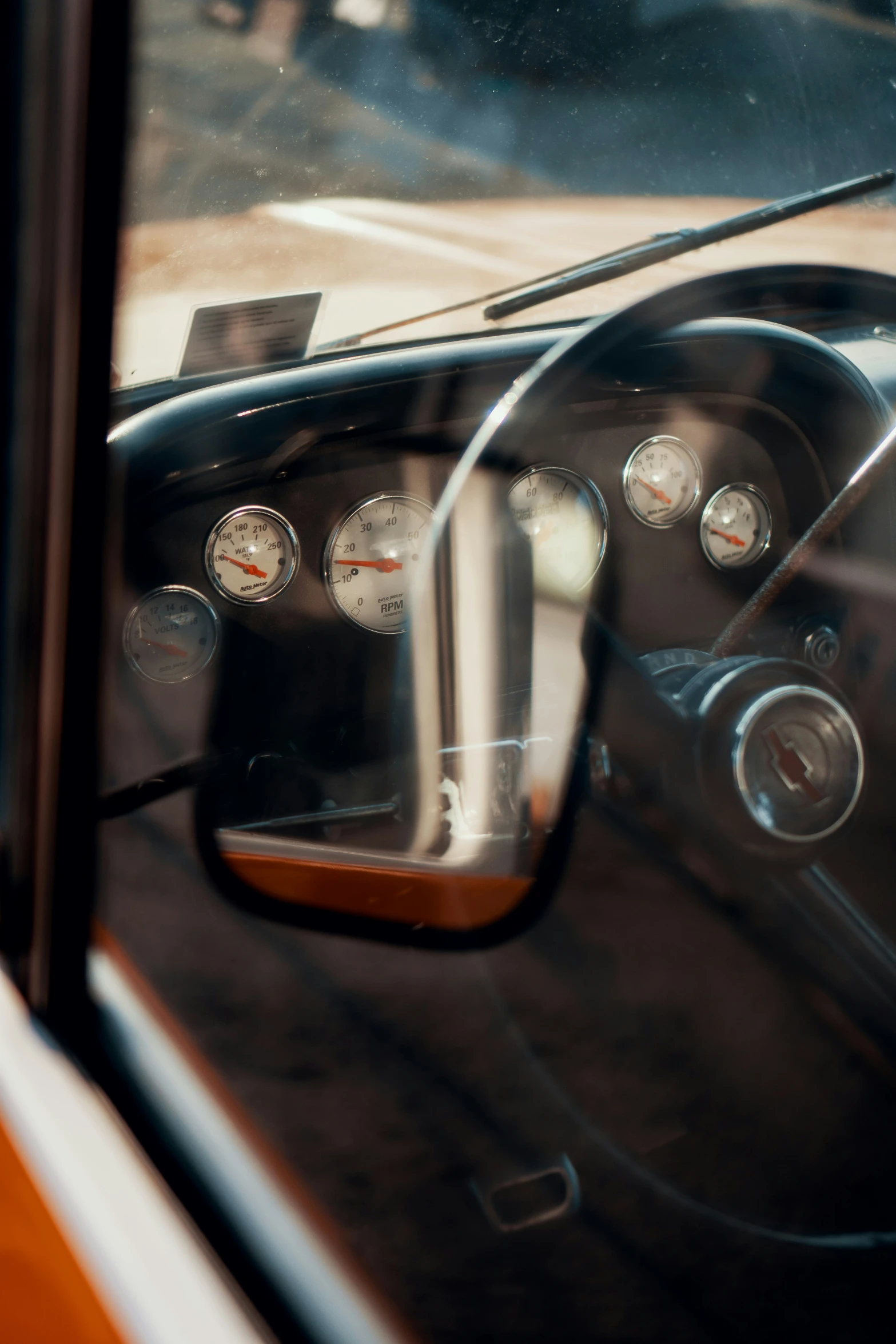 the dashboard of a car showing all the gauges on