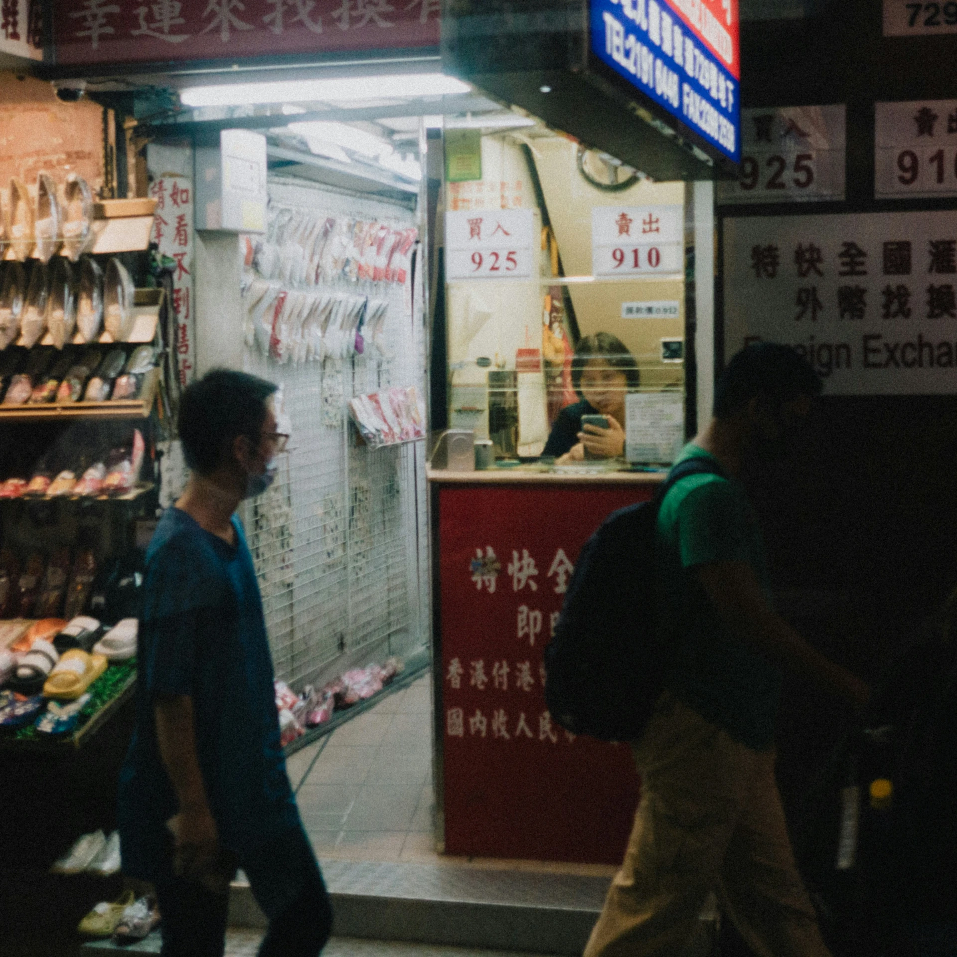 a man in the street shops selling food