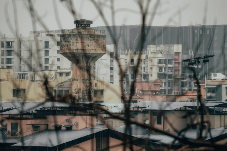 large buildings are behind a glass window