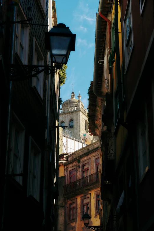 a view looking up a street with many buildings