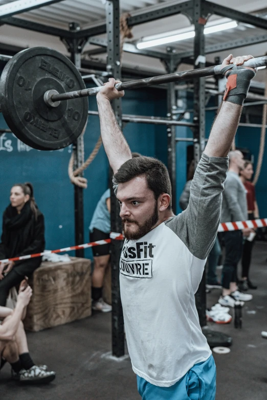 the athlete does crossfit with his arm