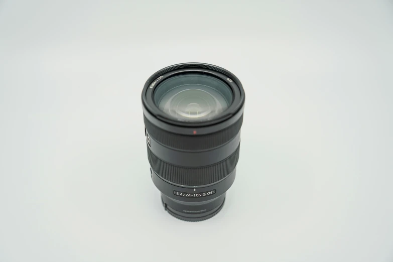 a camera lens on white with a reflection on it