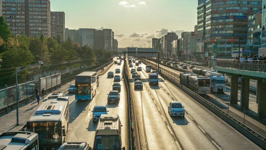 traffic on a busy highway in the middle of the afternoon