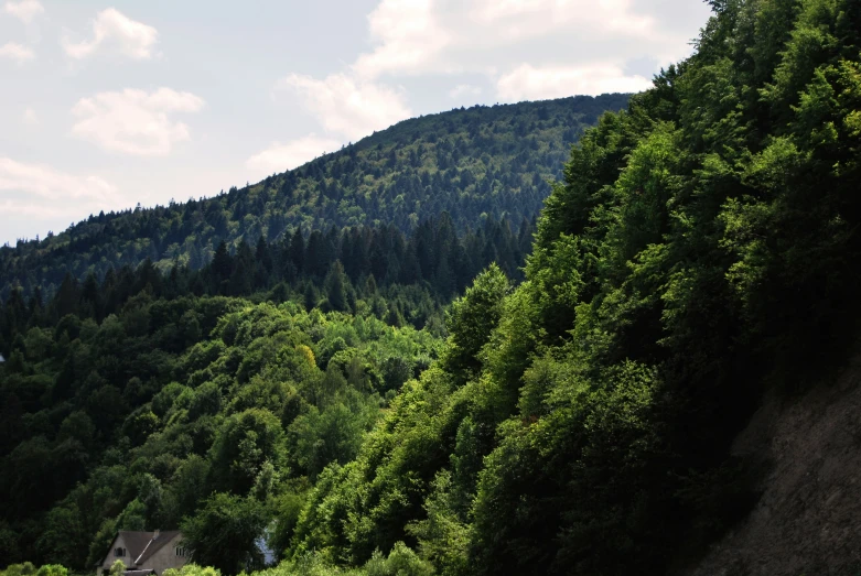 a view of the mountains with houses along side of it