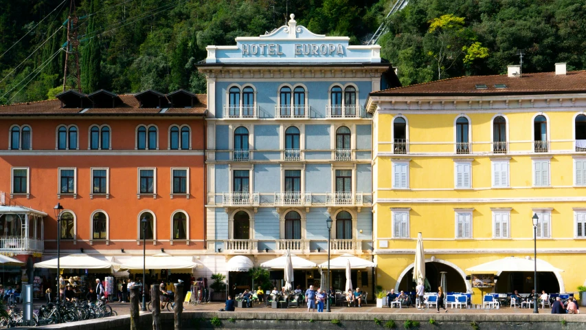 a group of buildings that are next to a body of water