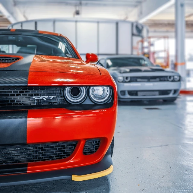 the front end of a dodge muscle car