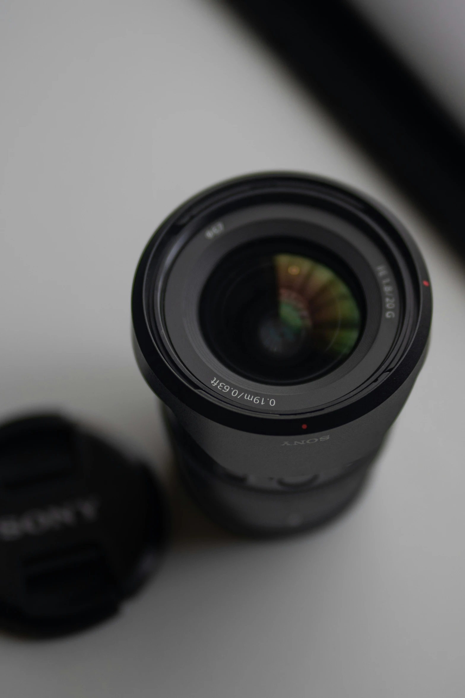 a camera lens with a macro attachment in the middle of it