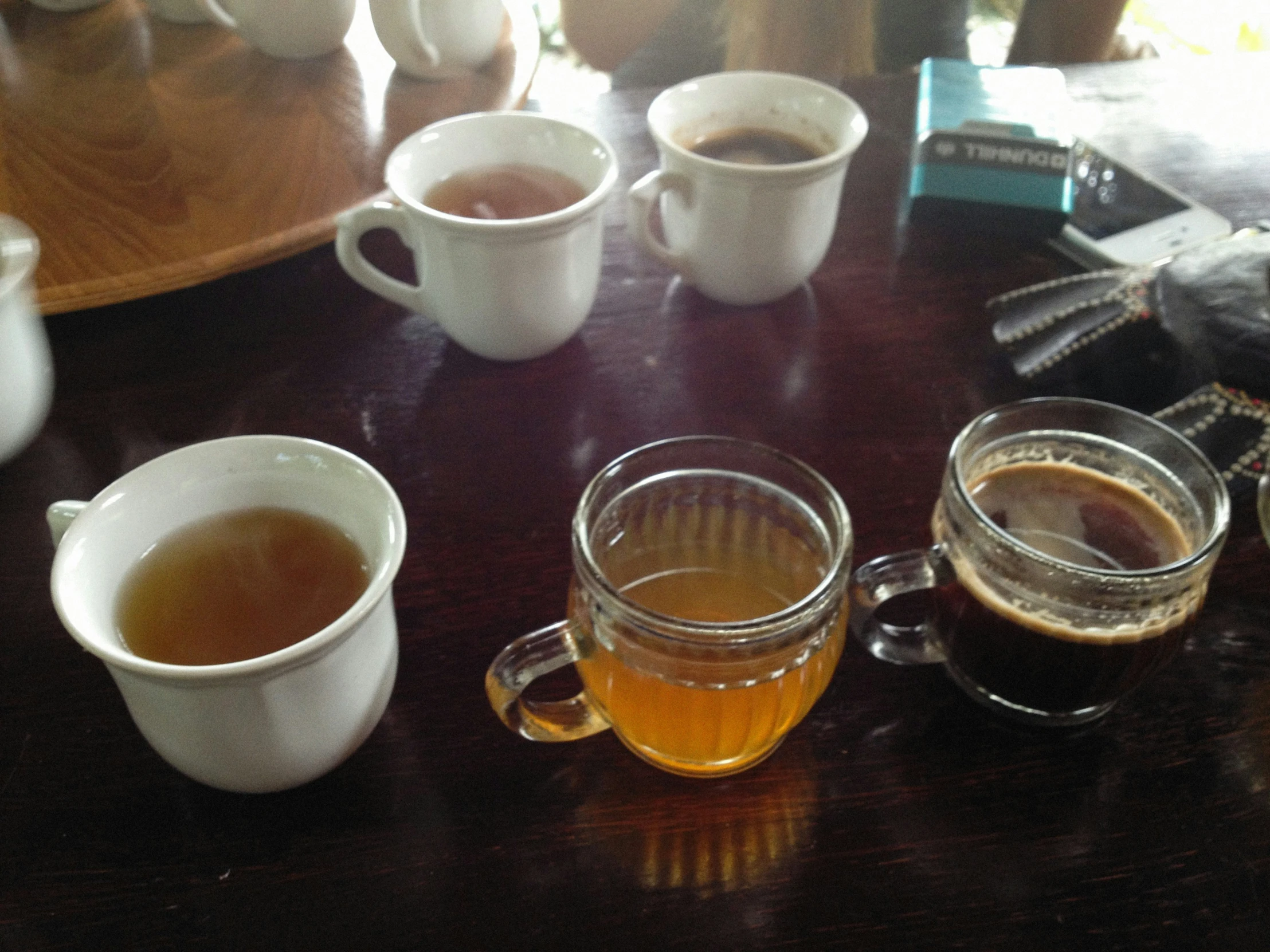 a bunch of cups that are on top of a table