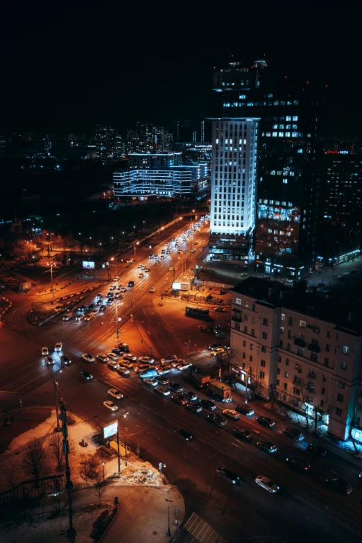 a city street at night with bright lights