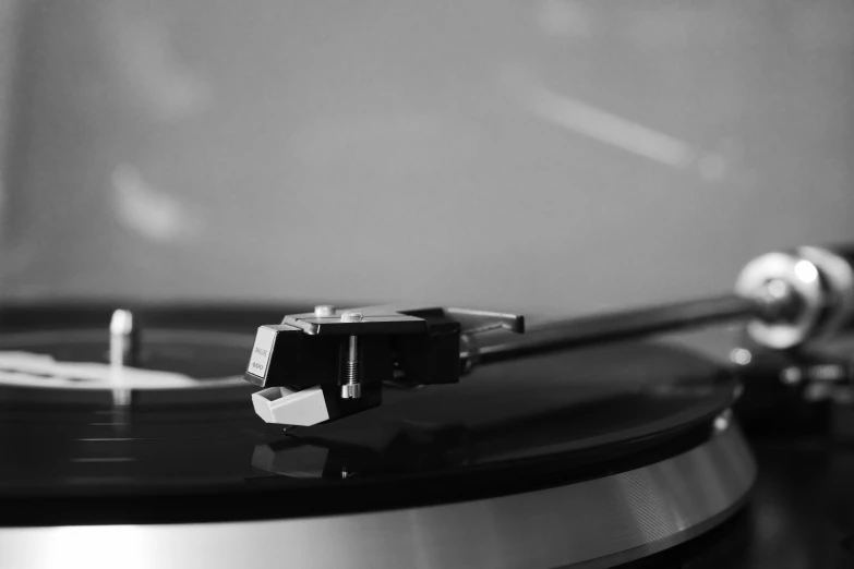 a turntable with two silver disks attached to it