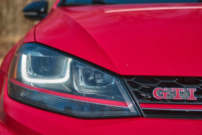 an emblem on the front of a car's headlight