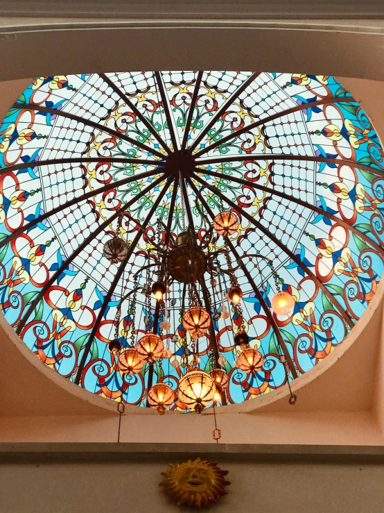 a large round window with lights in it