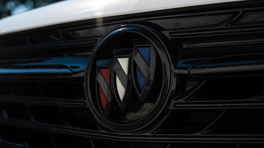 the front grill and grille of a car with a logo