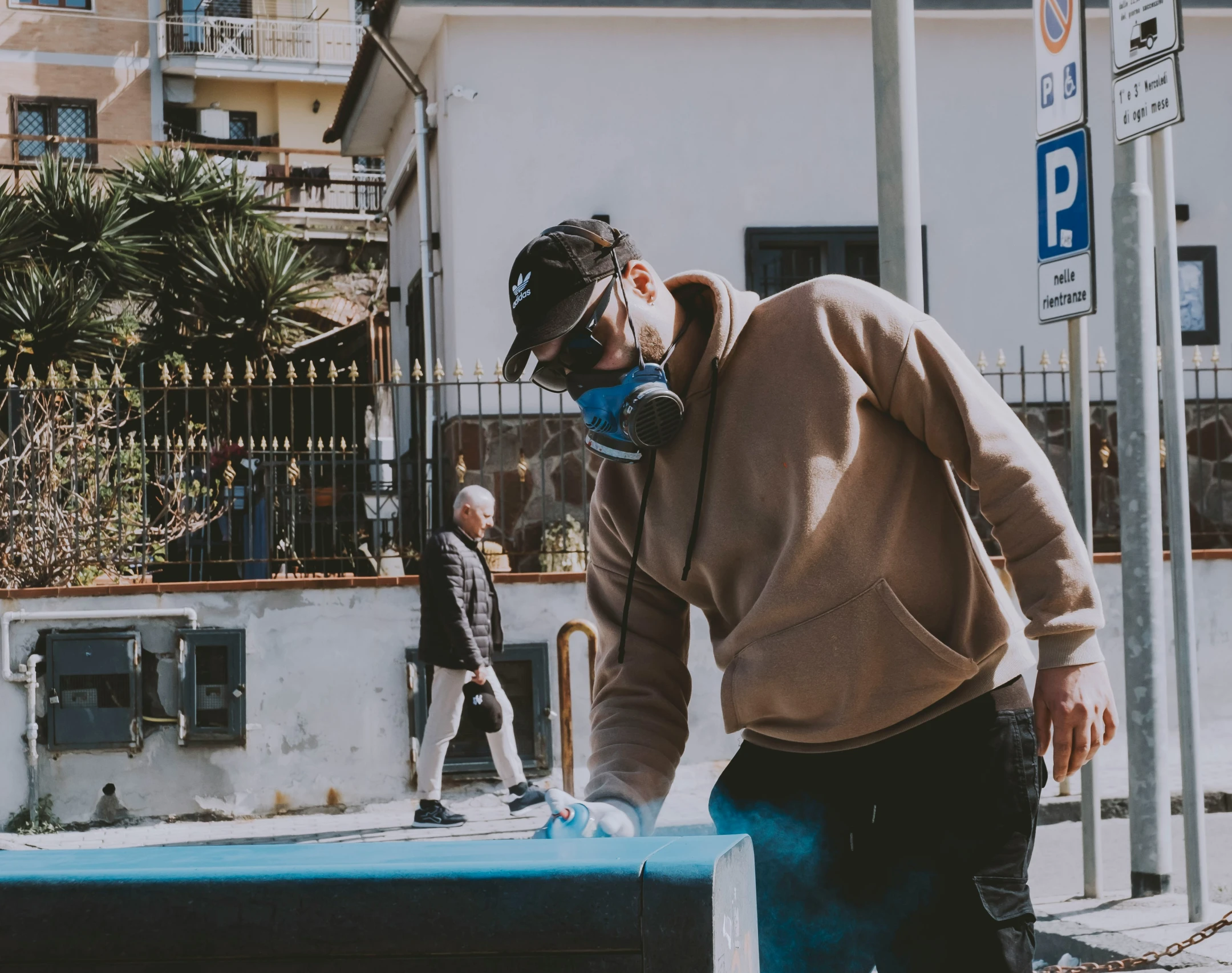 a man in a mask is using a skateboard