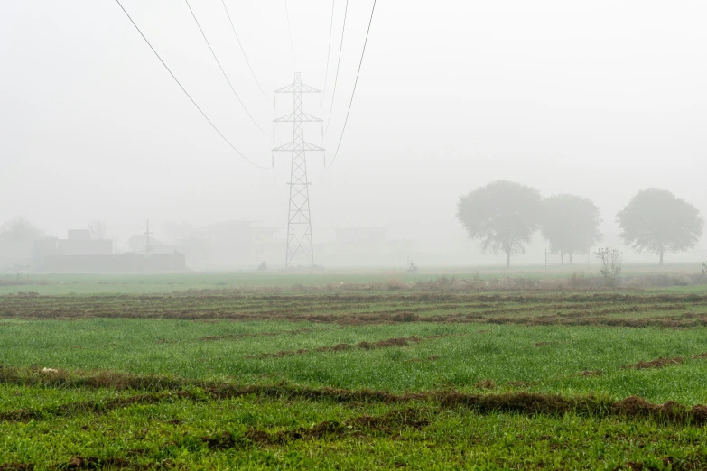 there are many electric power poles in the air