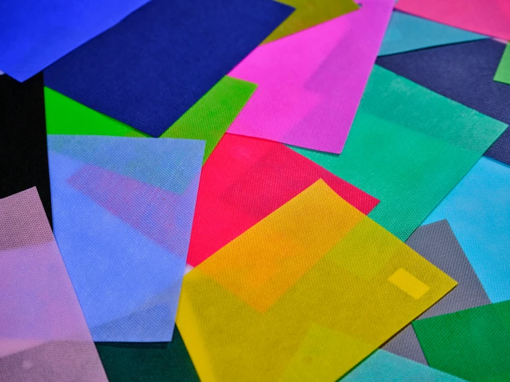 multiple color squares and shapes on different colors of cloth