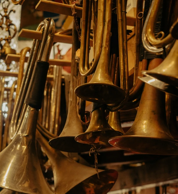 a bunch of ss objects hanging in a room