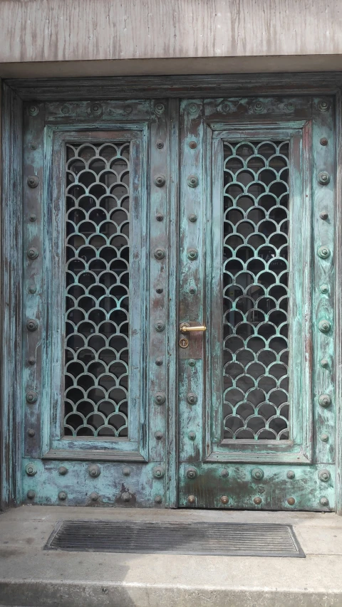 this is a old door with a window on the outside