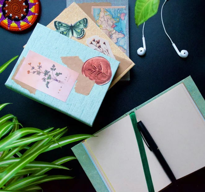 an assortment of cards, papers and headphones