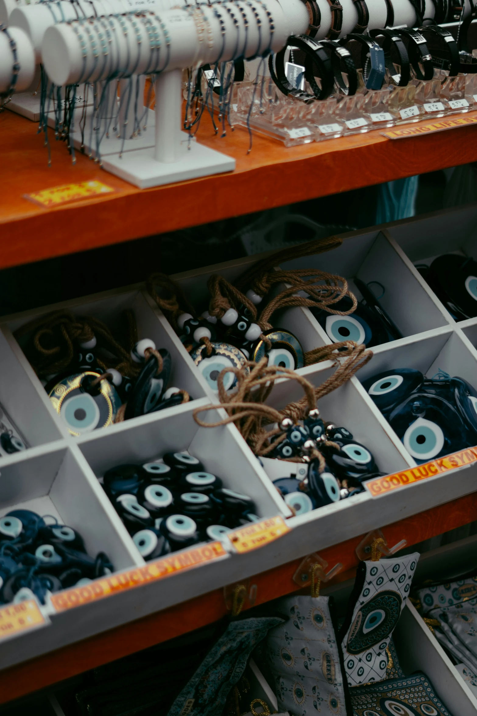 an assortment of accessories are in a box on the table