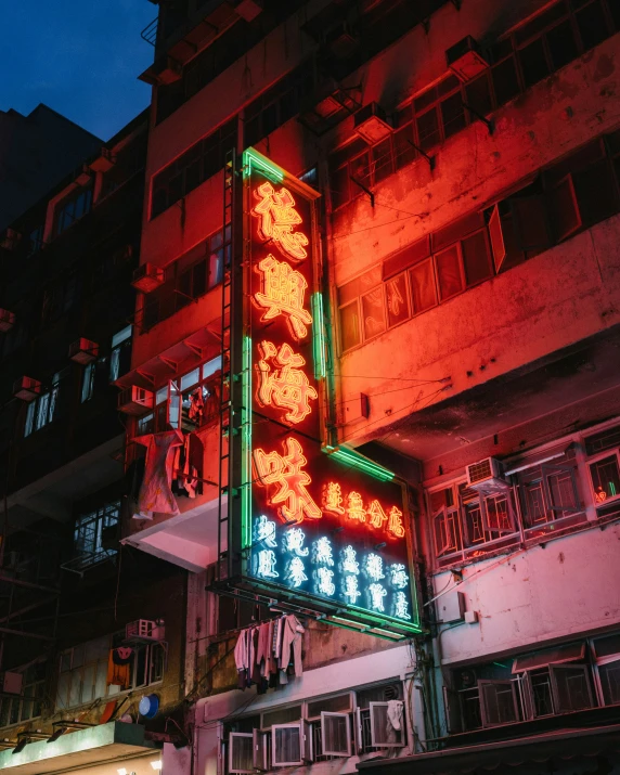 a chinese style lighted building lit up at night