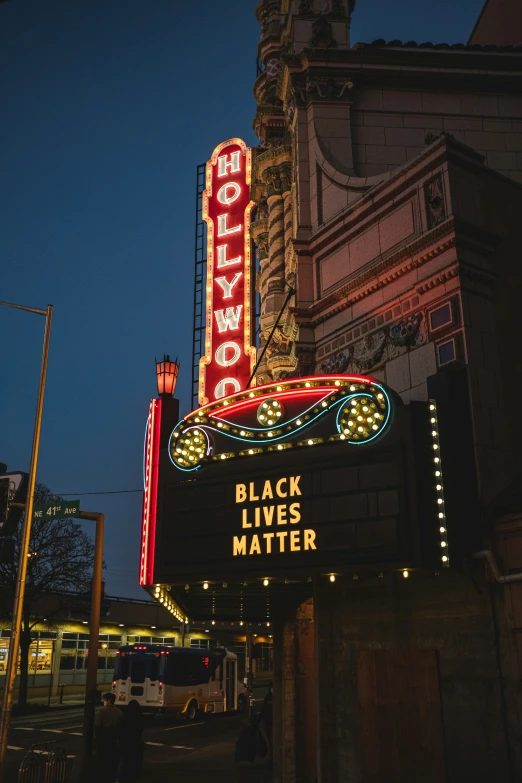 a tall sign that says black lives matter