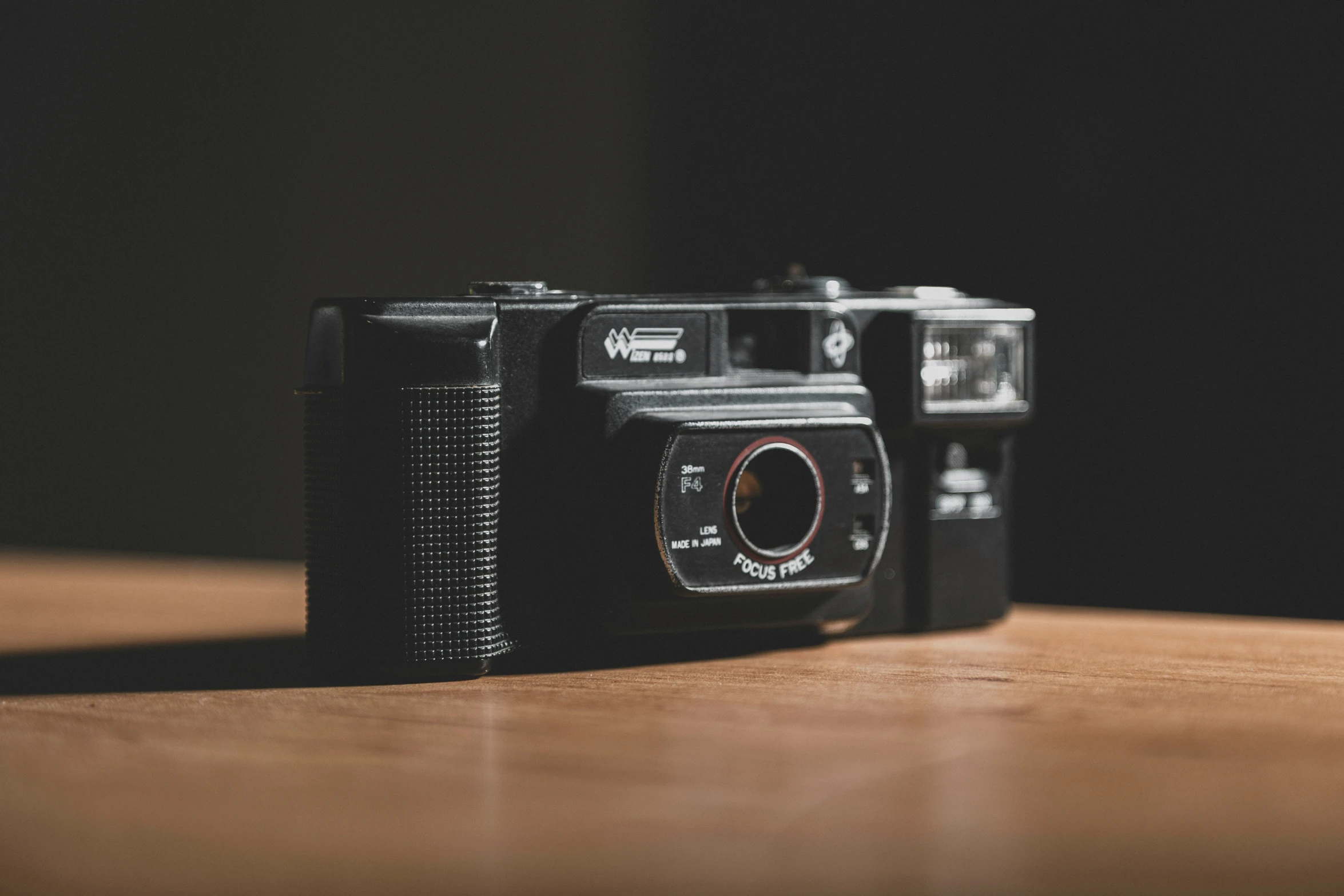 an old camera is seen on a table