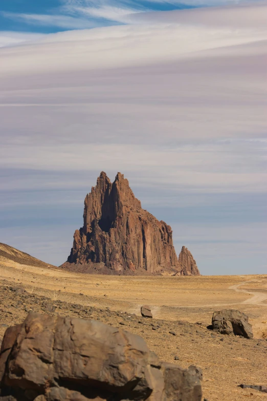 a rock formation in the middle of a desert